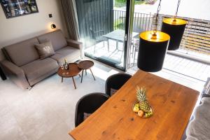 A seating area at Das luxuriöse alpine Apartment in der Residenz Silvretta - Inklusive Silvretta Card Premium