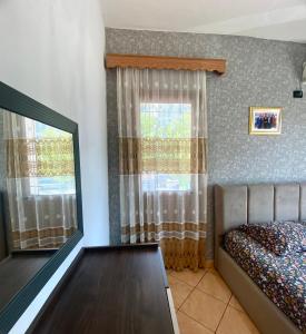 Ένα ή περισσότερα κρεβάτια σε δωμάτιο στο At-Salaj1