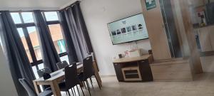a room with a desk and a table and chairs at Apartalux San Pedro Sol in San Pedro del Pinatar +80 photos
