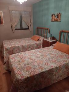 Postel nebo postele na pokoji v ubytování Medulillas de Yeres + 8 fotografií