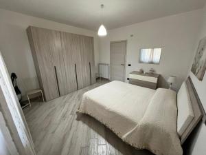 Ένα ή περισσότερα κρεβάτια σε δωμάτιο στο Casa Bruna +20 φωτογραφίες