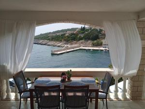 Φωτογραφία από το άλμπουμ του Apartment Krajančić Ivan & Neda σε Zavalatica