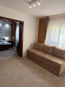A bed or beds in a room at MB Hotel