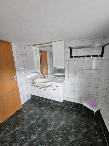 Koupelna v ubytování Am Lubenbach + 11 fotografií