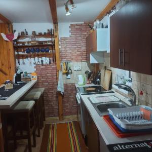 Kuchyň nebo kuchyňský kout v ubytování Chata Strbianka