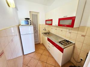 Kuchyň nebo kuchyňský kout v ubytování Apartments Carmen Vinisce
