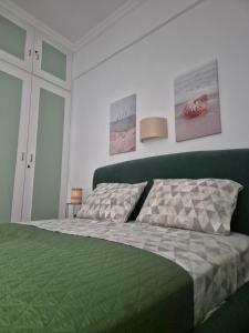 Postel nebo postele na pokoji v ubytování Captain's home loutraki