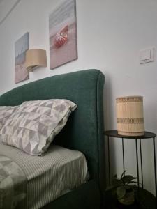 Postel nebo postele na pokoji v ubytování Captain's home loutraki