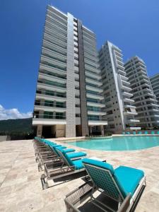 La alberca dentro o cerca de Patty del Mar Suites