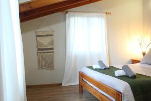 Postel nebo postele na pokoji v ubytování Nido Del Bosque + 37 fotografií