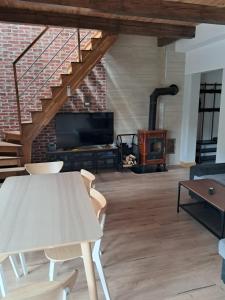 TV a/nebo společenská místnost v ubytování Apartament GUCIO