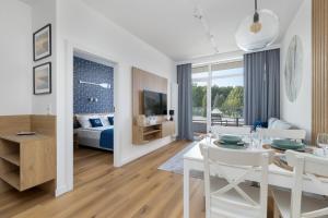 Postel nebo postele na pokoji v ubytování Apartament 3MOLA Ku Morzu - Basen, Balkon oraz Prywatny Taras na dachu, Free Parking, 150 metrów do Morza + 37 fotografií