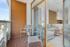 Balkón nebo terasa v ubytování Apartament 3MOLA Ku Morzu - Basen, Balkon oraz Prywatny Taras na dachu, Free Parking, 150 metrów do Morza