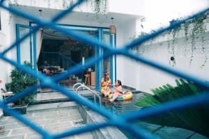 Imagem da galeria de Lazy Bear Villa By The Little Hoi An em Hoi An