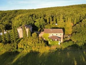 an aerial view of a house in the middle of a forest at La bastide de Meilhouret in Larroque +26 photos