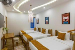 Imagem da galeria de Lazy Bear Villa By The Little Hoi An em Hoi An