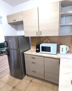 Η κουζίνα ή μικρή κουζίνα στο Sunny apartment near Rynek square
