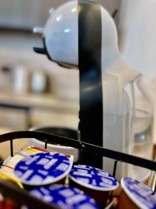 a group of blue and white plates on a stove at Rab Downtown Place in Rab
