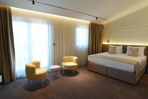 Postel nebo postele na pokoji v ubytování Avdissons Hotel + 96 fotografií