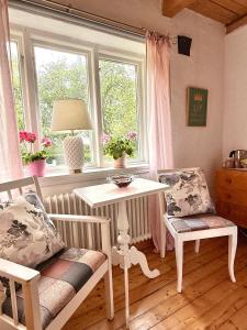 Posezení v ubytování Rävåkra B&B Österlen
