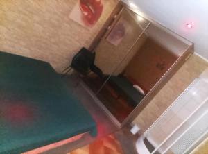 an overhead view of a living room with a green table at Apartament in Psary Małe