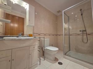 Ένα μπάνιο στο Apartamento Sanxenxo playa