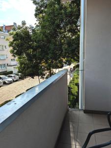 Μπαλκόνι ή βεράντα στο Sunny apartment near Rynek square +8 φωτογραφίες