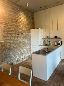 Η κουζίνα ή μικρή κουζίνα στο Helle Loft mit eingenem Garten