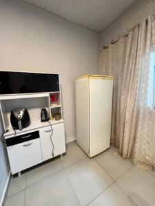Η κουζίνα ή μικρή κουζίνα στο Loft Premium Gurupi 404 +3 φωτογραφίες