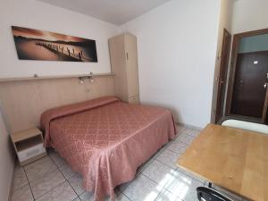 Postel nebo postele na pokoji v ubytování Camere la torre