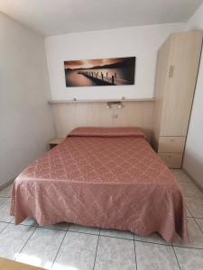 Postel nebo postele na pokoji v ubytování Camere la torre