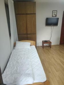 Postel nebo postele na pokoji v ubytování Vila Spas