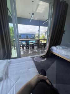Postel nebo postele na pokoji v ubytování ฟ้ารีสอร์ต FAH Resort