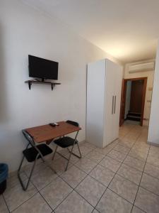 TV a/nebo společenská místnost v ubytování Camere la torre