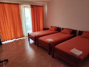 Postel nebo postele na pokoji v ubytování Apartmani590