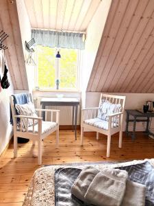 Posezení v ubytování Rävåkra B&B Österlen