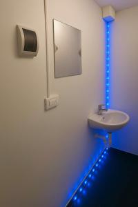 a bathroom with a sink and a mirror at hostal kactus in Caraz +48 photos