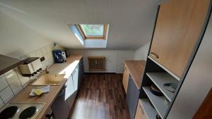 an overhead view of a kitchen with a skylight at Wienhagenblick Ferienwohnung in Kierspe
