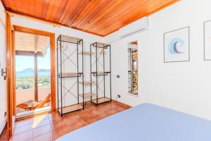 Letto o letti in una camera di Seaview vibes - Sardinia style