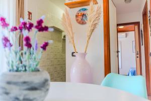 Letto o letti in una camera di Seaview vibes - Sardinia style