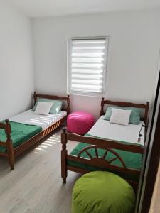 Postel nebo postele na pokoji v ubytování Guest house Gorica + 17 fotografií