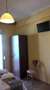 A television and/or entertainment centre at Apartments Palladium