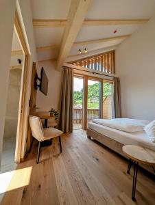 Postel nebo postele na pokoji v ubytování Hotel Schmuckhof