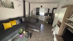 an overhead view of a living room with a couch at Apartmani Mirela in Krk