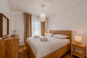 Postel nebo postele na pokoji v ubytování Penthouse Duplex Disneyland Paris - 10 pers - 4 Ch - 10 min