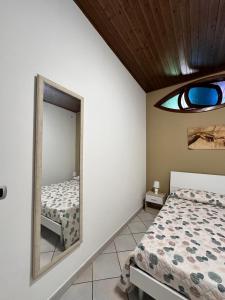 Ένα ή περισσότερα κρεβάτια σε δωμάτιο στο Aurene Casa Vacanza +14 φωτογραφίες