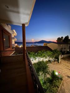 a balcony of a house with a view of the ocean at Seid Apartments Radhime in Vlorë