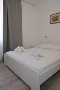 Posteľ alebo postele v izbe v ubytovaní Sesar Apartments Krk - No. 2 Vinko