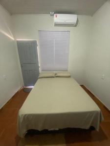Llit o llits en una habitació de BINOs