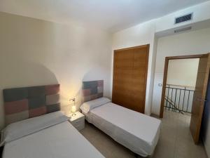 Postel nebo postele na pokoji v ubytování Villa Pinar Golf + 25 fotografií